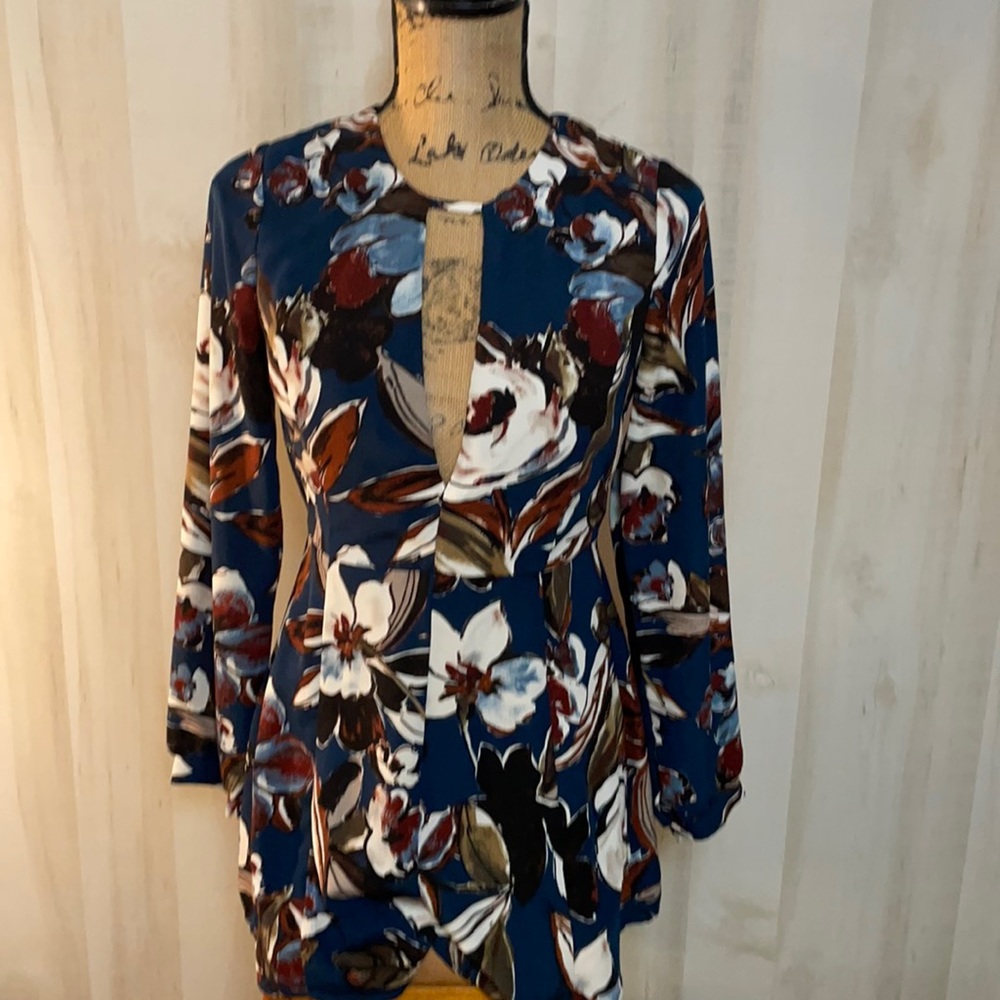 Lush Romper - Size 8.      S22